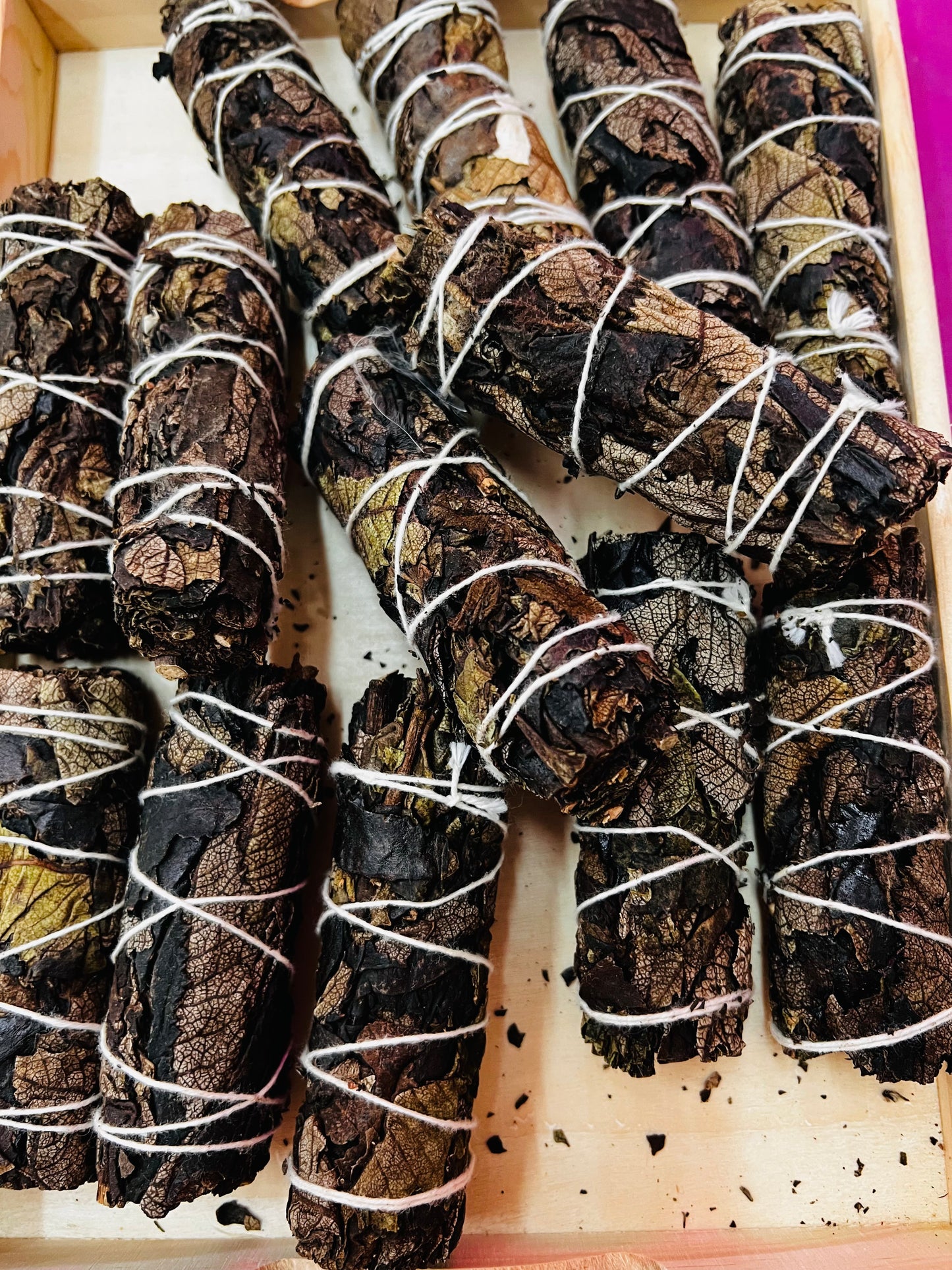 Handcrafted Black Sage smudge sticks bundled with natural cotton string for meditation, tarot readings, altar rituals, and spiritual practice.